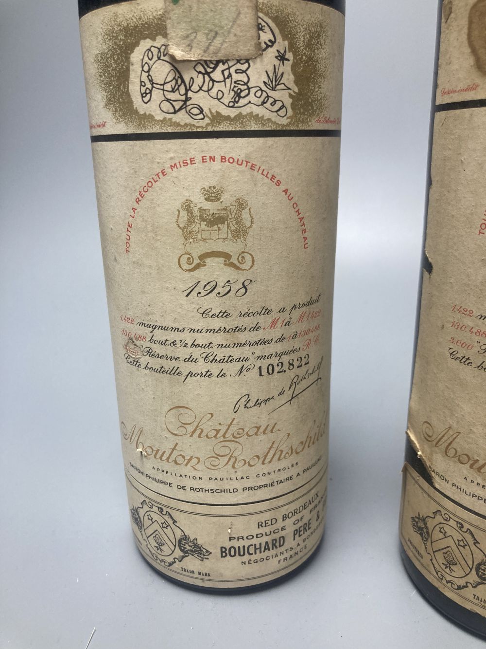 Two bottles of Chateau Mouton Rothschild 1958 (one foil lacking)